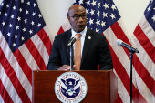 Los Angeles FBI Assistant Director in Charge Akil Davis attends a press conference, in Los Angeles
