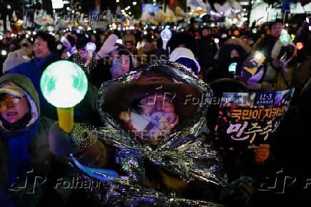 Protests on the first anniversary of former President Yoon Suk Yeol's December 3, 2024 martial law declaration, in Seoul