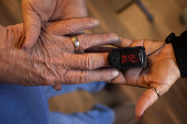 A coal miner suffering from black lung diease is checked for oxygen levels in Cedar Bluff, Virginia