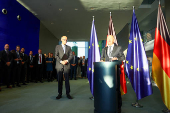 German Chancellor Olaf Scholz hands over to his successor Friedrich Merz