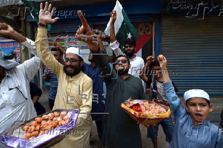 Markazi Muslim League celebrate after Pakistan shoots down Indian fighter jets
