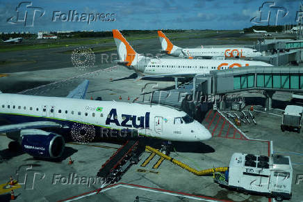 FILE PHOTO: Gol and Azul airlines planes are pictured at Luis Eduardo Magalhaes International Airport in Salvador
