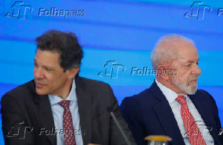 O ministro da Fazenda, Fernando Haddad, e o presidente Lula em evento