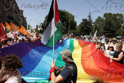 Pro-Palestinian protesters attend a demonstration calling for an end to the bombing in Gaza, in Rome