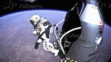 Pilot Felix Baumgartner of Austria jumps out from the capsule during the final manned flight for Red Bull Stratos in Roswell, New Mexico