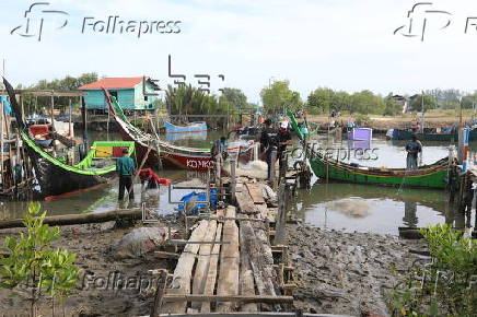 Daily life of fishermen in a traditional fishing port