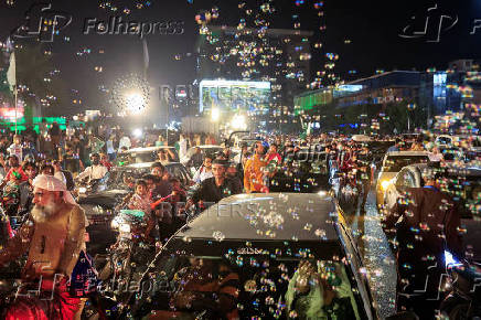 People attend Pakistan's Independence Day celebration in Lahore
