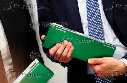 German Chancellor Friedrich Merz visits a battery cell production facility in Muenster