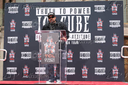 Rapper and actor Ice Cube gets hands and feet cemented in Hollywood