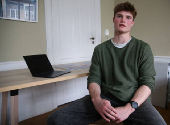 Harvard student Alfred Williamson, who comes from Wales, talks during an interview in Copenhagen