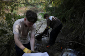 Chilean volunteers combat plastic waste in the Mapocho river, in Santiago