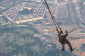 U.S. Army Golden Knights parachute team perform during the Twilight Tattoo ceremony