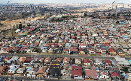 A drone view shows a residential area in Soweto,