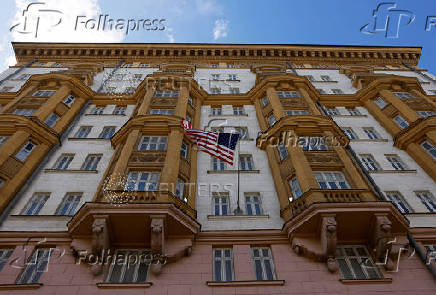 An American flag flutters on the facade of the U.S. Embassy in Moscow