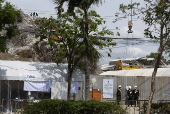 Rescuers search for survivors after signs of life detected under Bangkok building rubble