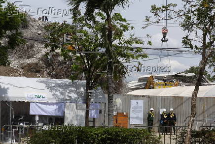 Rescuers search for survivors after signs of life detected under Bangkok building rubble