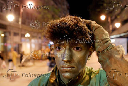 Live statue artists perform to mark World Art Day in Skopje