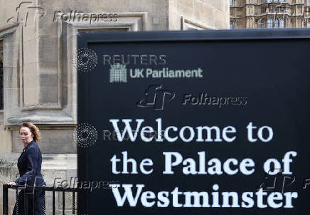 Britain?s Reform Party MP Pochin walks into Houses of Parliament in London