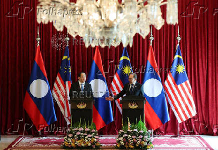 The Prime Minister of Laos met his Malaysian counterpart during his visit to Malaysia
