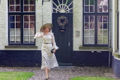 Queen Mathilde of Belgium visits the Beguinage 'Ten Wijngaerde' in Bruges