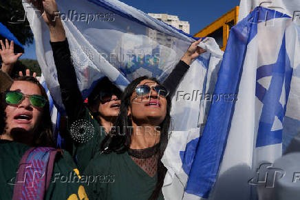 Brazilians attend an evangelical march to celebrate Corpus Christi in Sao Paulo