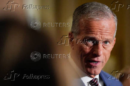 U.S. Senate Majority Leader John Thune talks to reporters on Capitol Hill