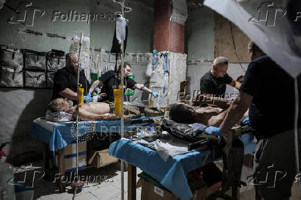 Ukrainian Armed Forces combat medics treat injured servicemen near Chasiv Yar
