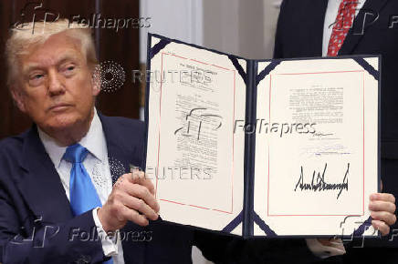 U.S. President Trump signs the VA Home Loan Program Reform Act at the White House in Washington, D.C.