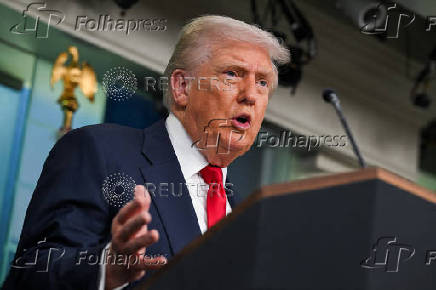 U.S. President Trump meets members of the media at the White House in Washington, D.C.