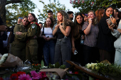 People mourn Israeli soldier Staff Sergeant Lior Steinberg, in Petah Tikva