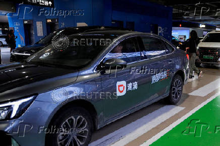 FILE PHOTO: A car of Chinese ride-hailing service Didi is seen at the Shanghai Hongqiao International Airport in Shanghai