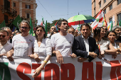 Pro-Palestinian protesters attend a demonstration calling for an end to the bombing in Gaza, in Rome