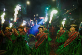 Bolivians celebrate the Gran Poder parade, in La Paz