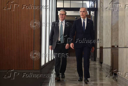 Canada's Prime Minister Mark Carney and Britain's Prime Minister Kier Starmer meet on Parliament Hill in Ottawa