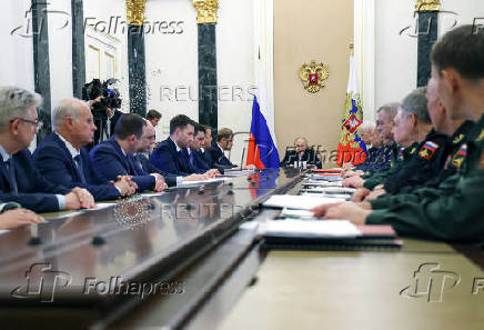 Russia's President Putin chairs a meeting with senior officials and military commanders in Moscow
