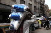 Surging food prices and rising inflation are reshaping Pakistani grocery markets