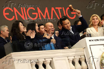 Traders work on the floor of the NYSE in New York