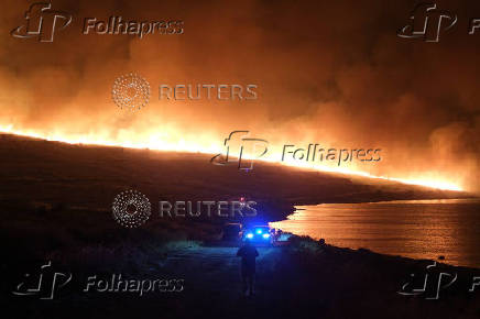A wildfire burns near Alacati in Izmir province
