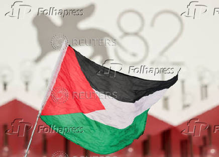 Supporters gather to call for Palestinian protest during the 82nd Venice Film Festival