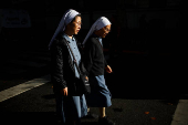 Nuns walk towards the Buenos Aires Metropolitan Cathedral, in Buenos Aires