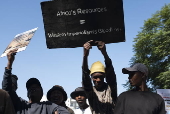 Environmental activists protest against TotalEnergies in Johannesburg