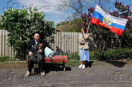 WW2 veteran Pampukhov receives congratulations on Victory Day amid Russia-Ukraine conflict in Donetsk region