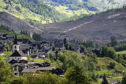 Swiss village almost buried after collapse of glacier