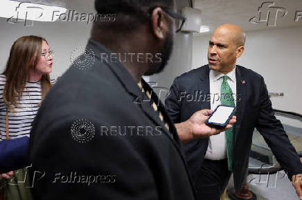 U.S. Senator Booker walks to the Senate floor to vote at the U.S. Capitol in Washington