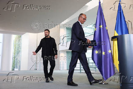 German Chancellor Merz speaks to the media, in Berlin