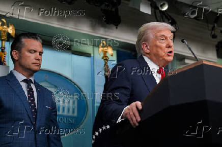 FILE PHOTO: U.S. President Trump meets members of the media at the White House in Washington, D.C.
