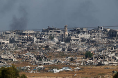 Smoke rises from Gaza, as seen from the Israel