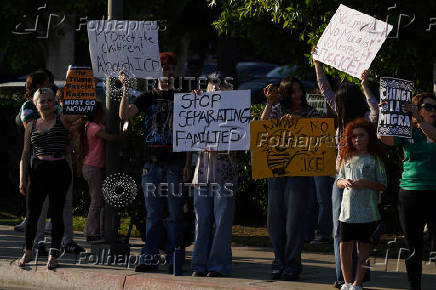 Protest against federal immigration sweeps, in Downey