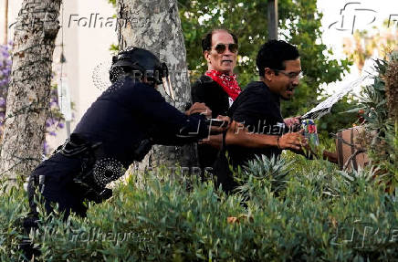 Protests against federal immigration sweeps continue in Los Angeles