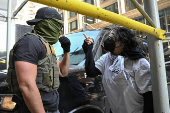 Protest against federal immigration sweeps, in Chicago